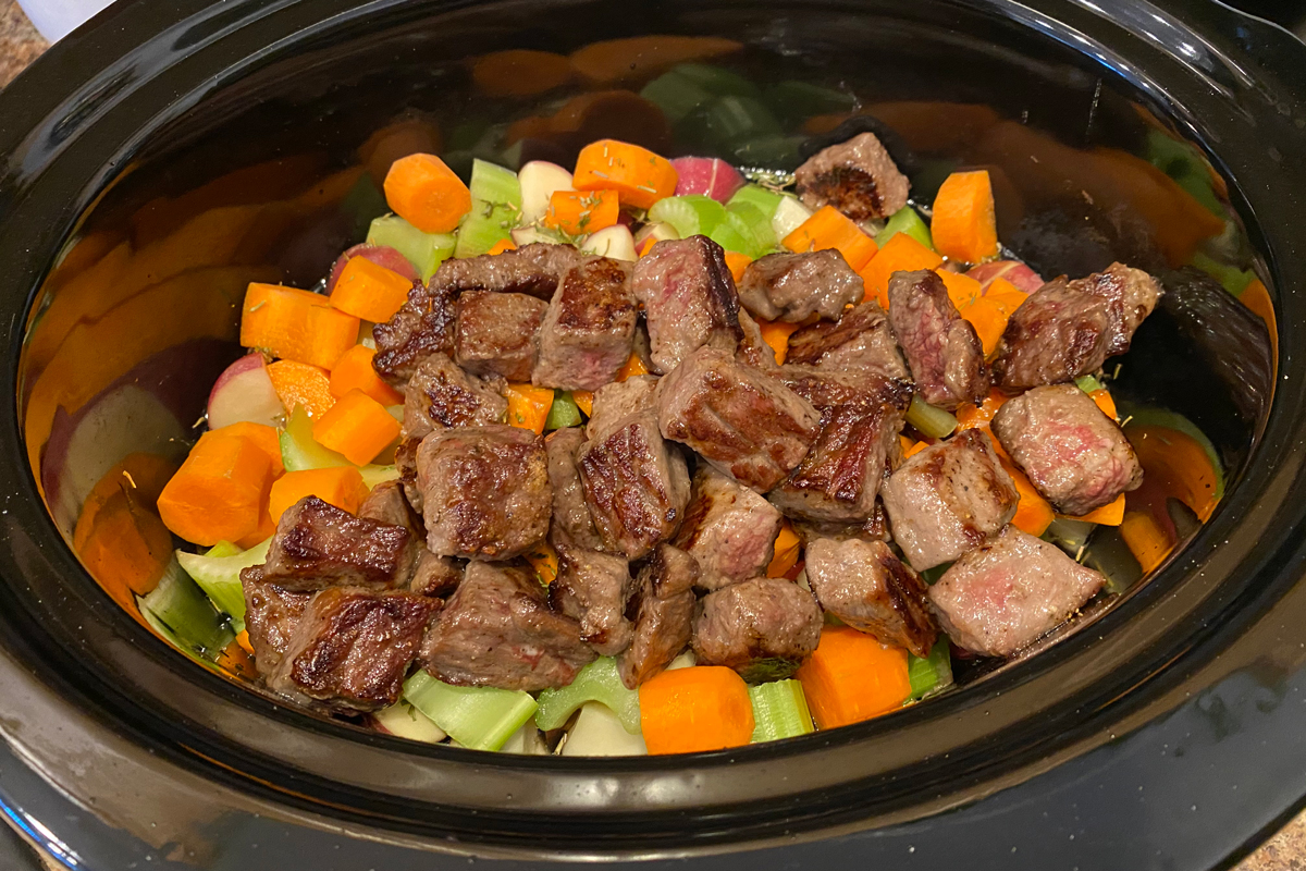 add beef to slow cooker