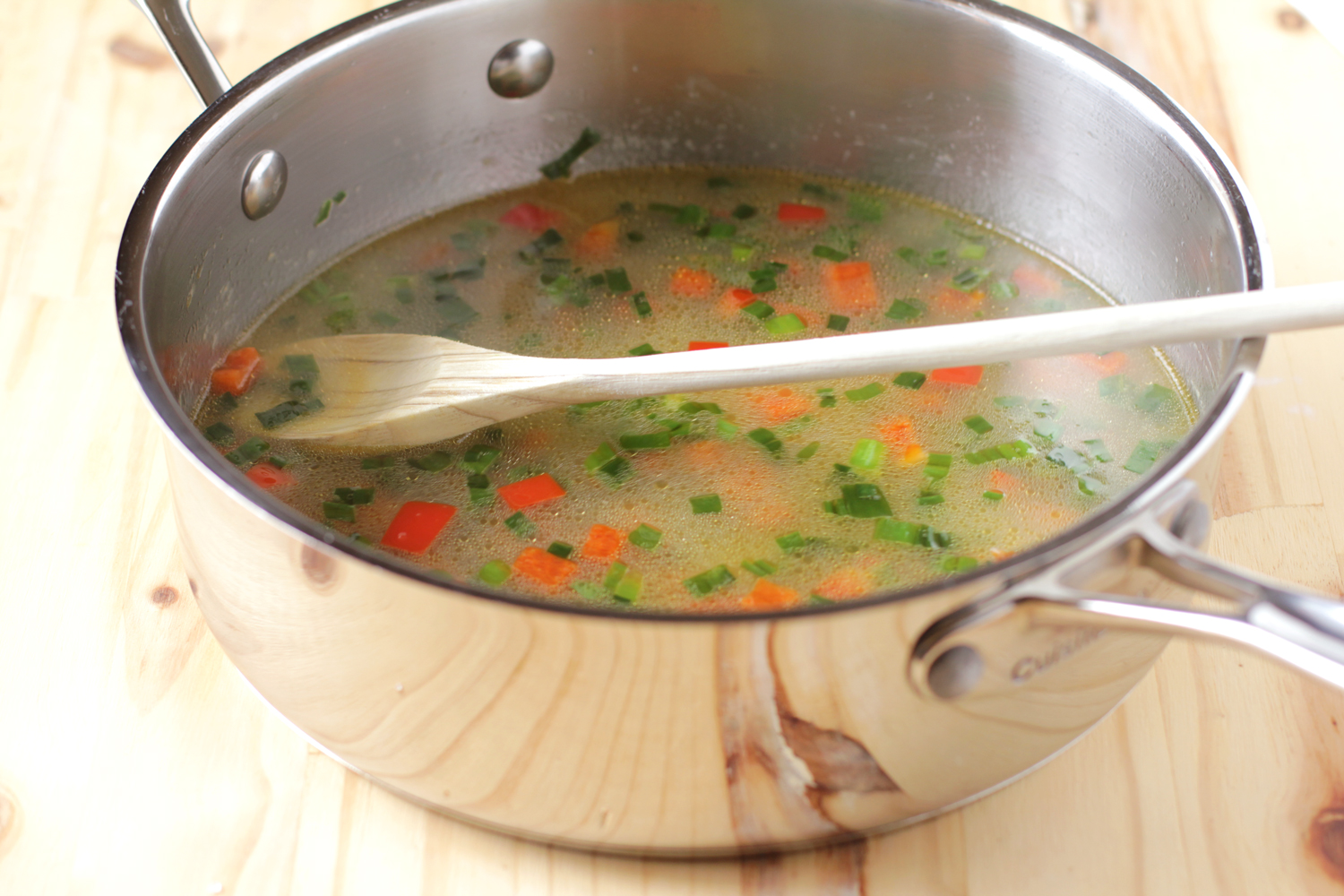 add broth to veggies