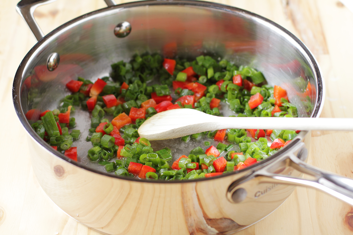 Saute red pepper and scallions in butter