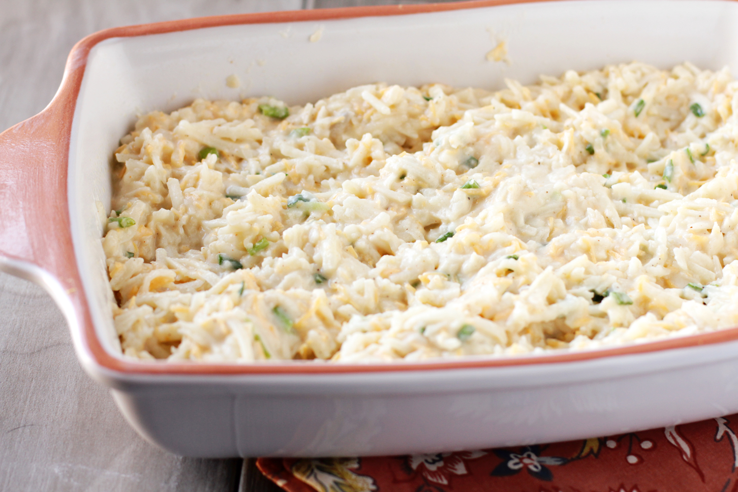 making cheesy hashbrown casserole