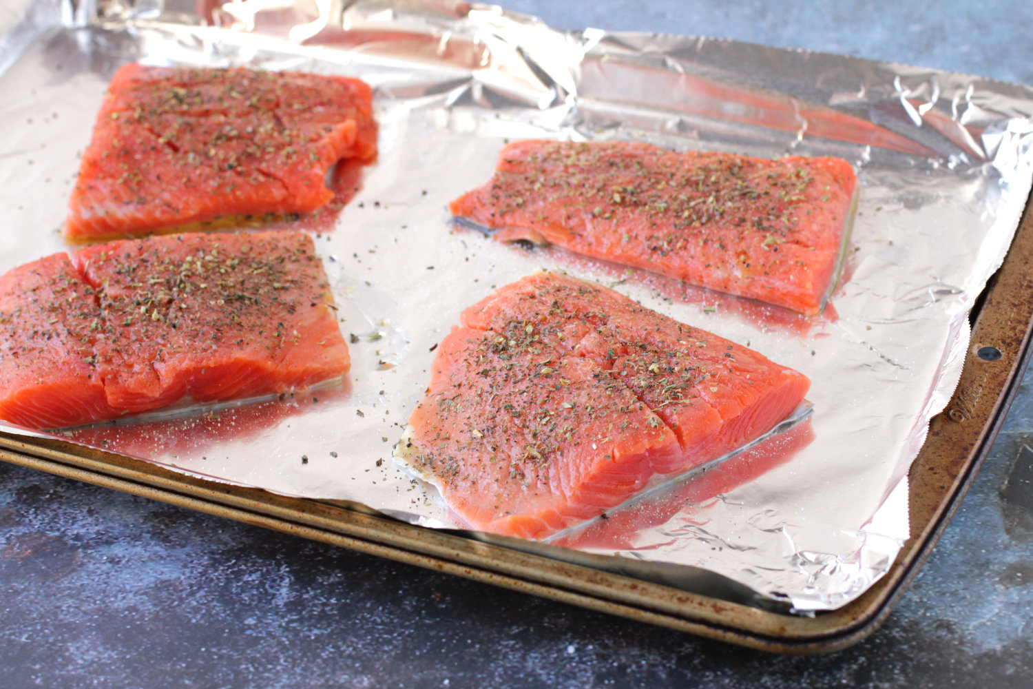 Raw salmon seasoned with herbs